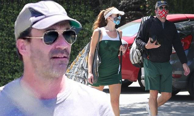Jon Hamm - Jon Hamm goes casual as he heads out to play tennis with longtime rumored girlfriend Anna Osceola - dailymail.co.uk - Los Angeles