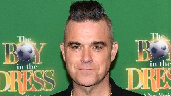 Robbie Williams - Ayda Field - Robbie Williams reveals his father has been diagnosed with Parkinson’s disease - breakingnews.ie - Britain - Los Angeles