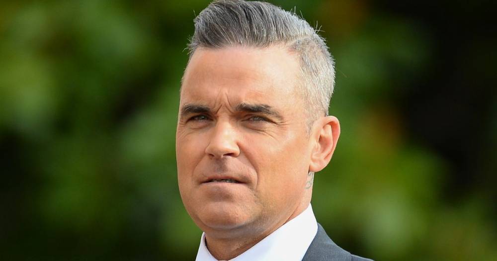 Robbie Williams - Robbie Williams opens up on ‘fear and panic’ as his dad is diagnosed with Parkinson’s disease - ok.co.uk