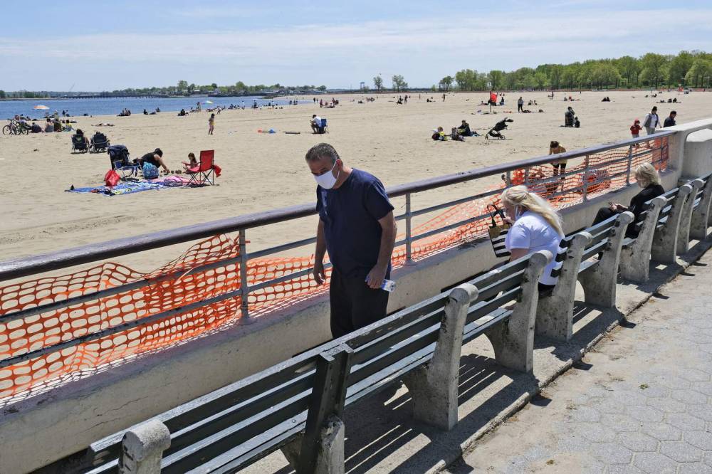 Andrew Cuomo - What a weekend: Cuomo eases ban on groups; NYC beaches open - clickorlando.com - New York - city New York - county Liberty