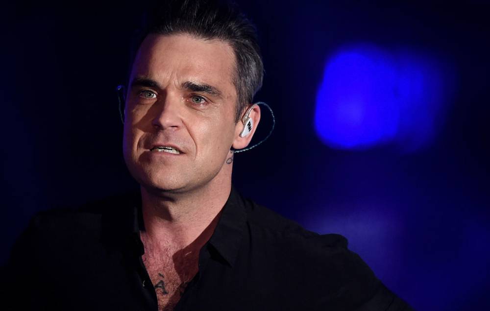 Robbie Williams - Robbie Williams reveals his father has been diagnosed with Parkinson’s disease - nme.com - Britain - Los Angeles
