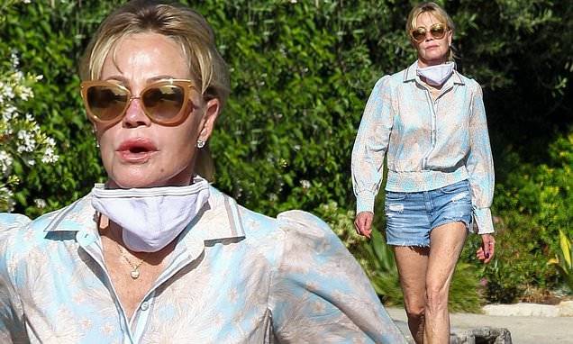Melanie Griffith - Beverly Hill - Daisy Dukes - Melanie Griffith, 62, shows off her trim pins as she struts around in a pair of Daisy Dukes - dailymail.co.uk - county Hill