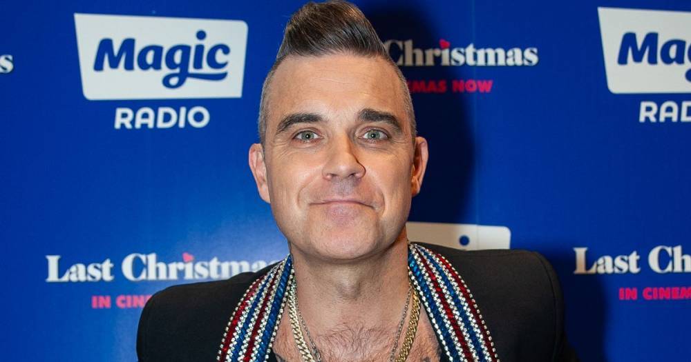 Simon Cowell - Robbie Williams - Robbie Williams hoping to mimic Simon Cowell's success by becoming TV mogul - mirror.co.uk