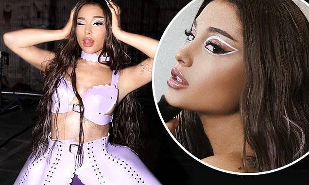 Ariana Grande flashes flesh in sci-fi-inspired bra on set of her and Lady Gaga's music video - dailymail.co.uk