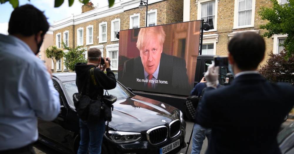 Boris Johnson - Dominic Cummings - Giant video of Boris Johnson saying 'stay home' parked outside Dominic Cummings' house - mirror.co.uk