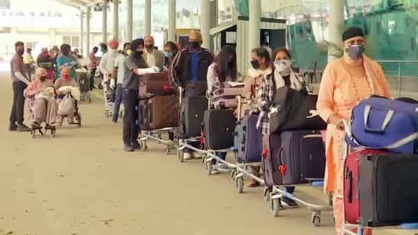 Relief for stranded NRIs as Centre allows travel, with strict conditions - livemint.com - city New Delhi - India
