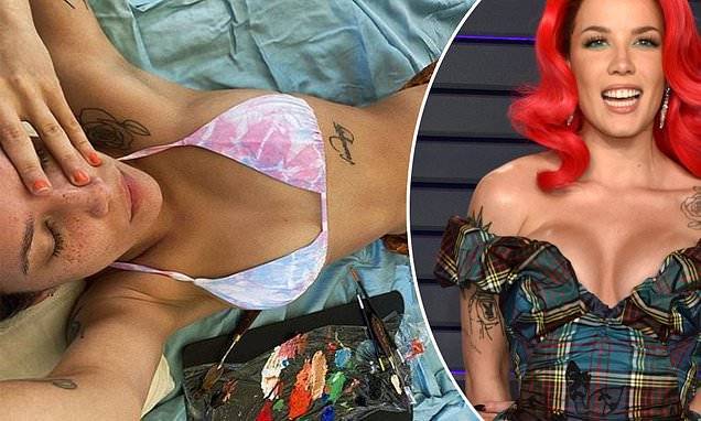 Halsey flaunts her curves in a tie dye bikini top and asks: 'am I dead, tired, or meditating' - dailymail.co.uk
