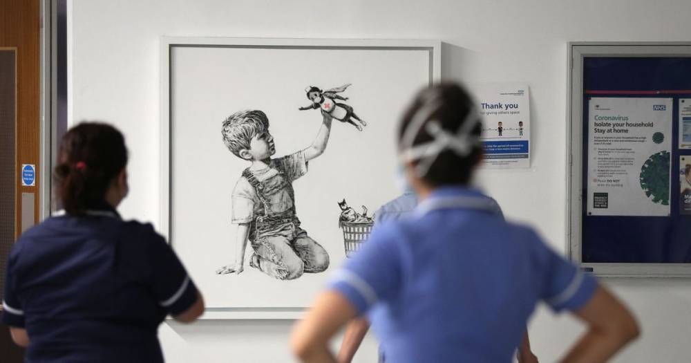 Burglar in hazmat suit with drill caught trying to steal hospital's £5m Banksy artwork - mirror.co.uk