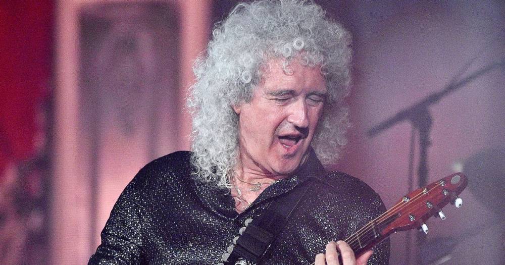 Brian May - Queen star Brian May pictured with crutches ahead of sharing heart attack ordeal - dailystar.co.uk
