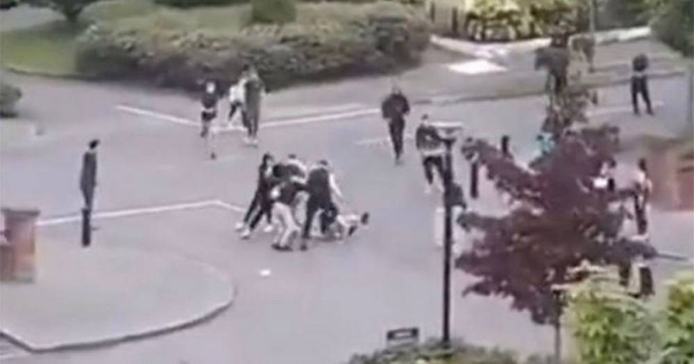 Teen kicked in the head as huge 70-person brawl erupts in front of shoppers - dailystar.co.uk - Ireland - city Cork