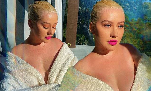 Christina Aguilera - Christina Aguilera exposes cleavage in her bathrobe during 'cozy and calm' Memorial Day Weekend - dailymail.co.uk