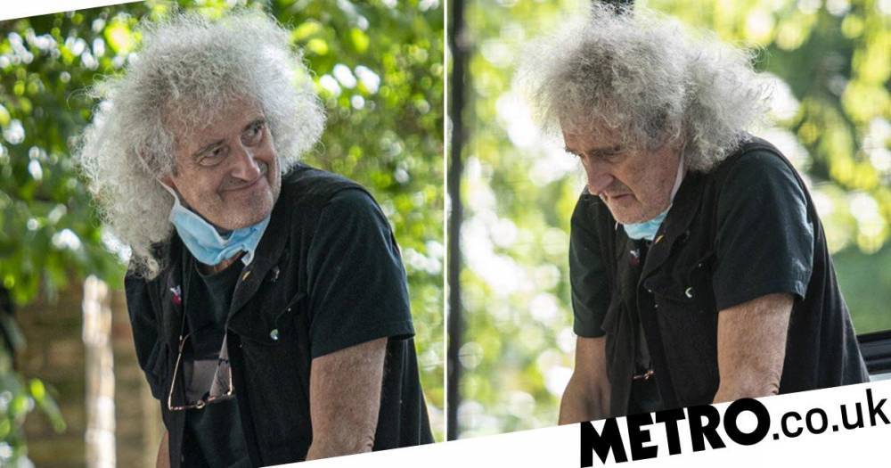 Brian May - Brian May heads out on crutches after suffering heart attack and undergoing operation to install three stents - metro.co.uk - city London