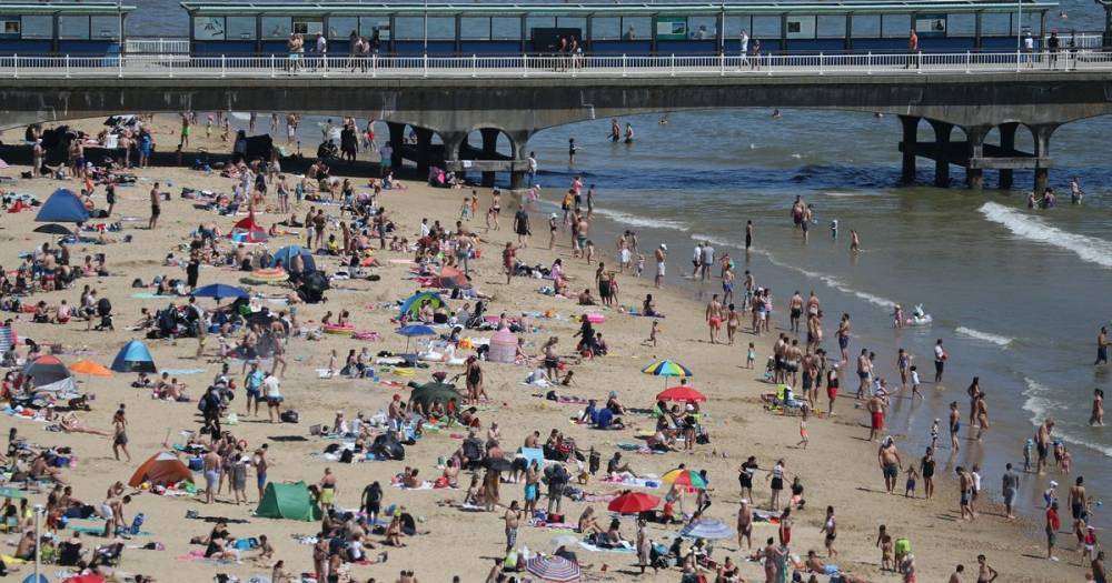 Common sense plea after hoards flock to beaches on Bank Holiday Monday - manchestereveningnews.co.uk - city London