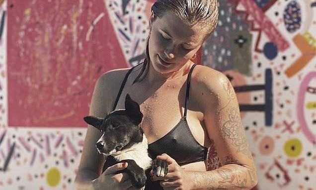 Corey Harper - Kim Basinger - Ireland Baldwin poses poolside in black bikini with cute rescue pup Pieces as she enjoys LA heatwave - dailymail.co.uk - Ireland