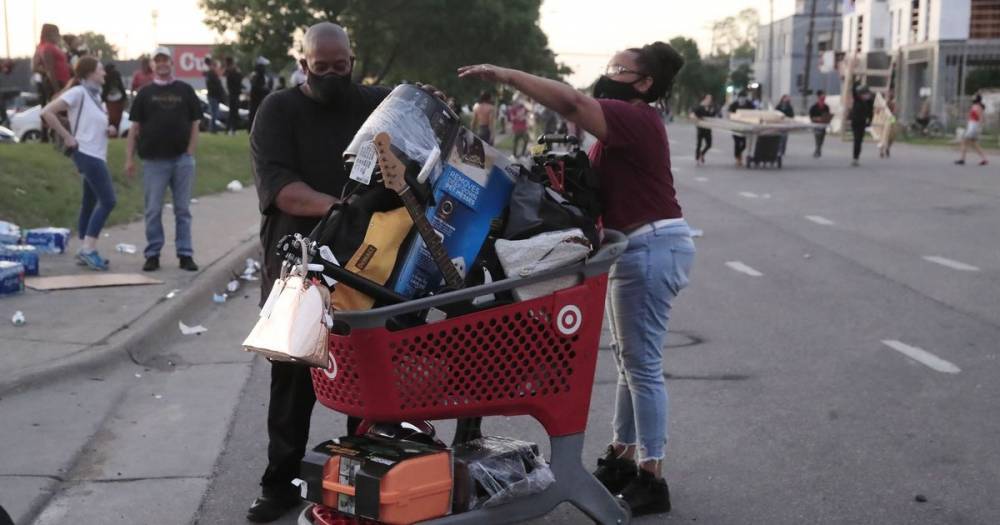 George Floyd - Minneapolis protest: Looters steal TVs and raid shops as anger after George Floyd's death grows - dailystar.co.uk - city Minneapolis