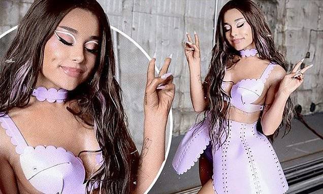 Ariana Grande looks out-of-this-world in futuristic lavender costume from the Rain On Me music video - dailymail.co.uk