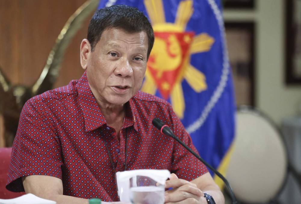Rodrigo Duterte - Asia Today: Duterte easing lockdown in Philippine capital - clickorlando.com - Philippines - city Manila