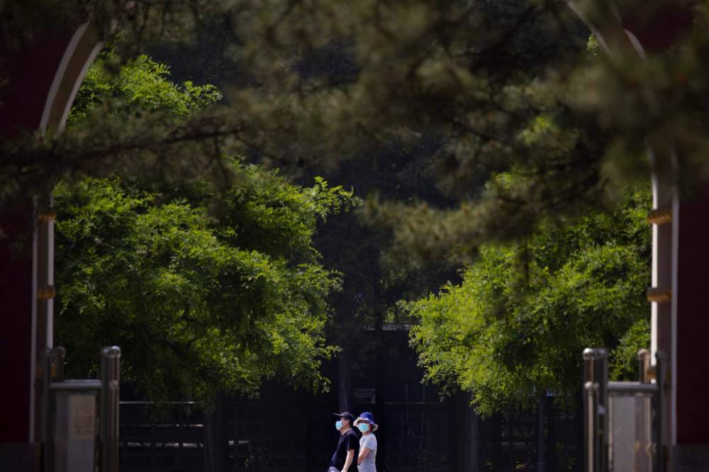 The Latest: Residents flocking to tourist sites in China - clickorlando.com - China - city Beijing - city Shanghai