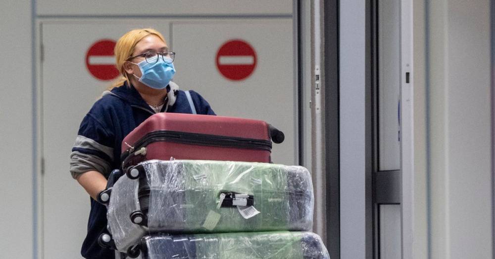Passengers and staff at Manchester Airport will have to wear gloves and masks - and bosses are trialling temperature scanners - as stricter measures are brought in - manchestereveningnews.co.uk - Britain - city Manchester