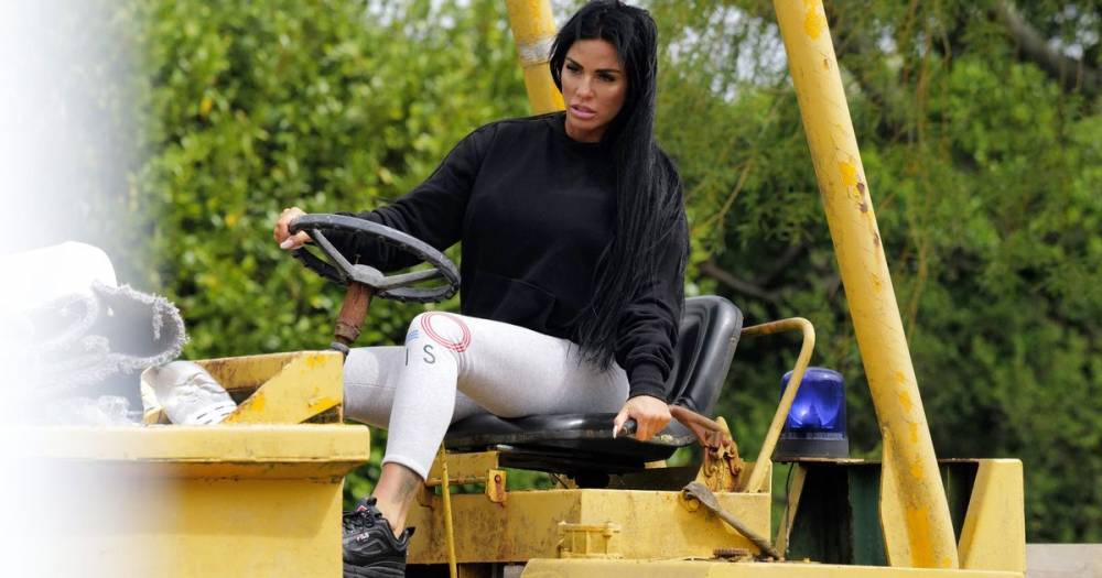 Katie Price - Katie Price drives dump truck as she cleans up all the rubbish from her £2million mucky mansion - mirror.co.uk