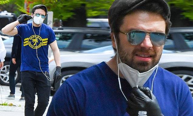 Sebastian Stan takes precautions with latex gloves and a medical face mask in NYC - dailymail.co.uk