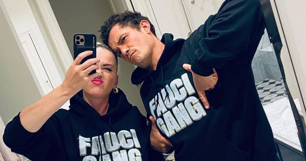 Anthony Fauci - Pregnant Katy Perry and Orlando Bloom don matching coronavirus charity jumpers - mirror.co.uk