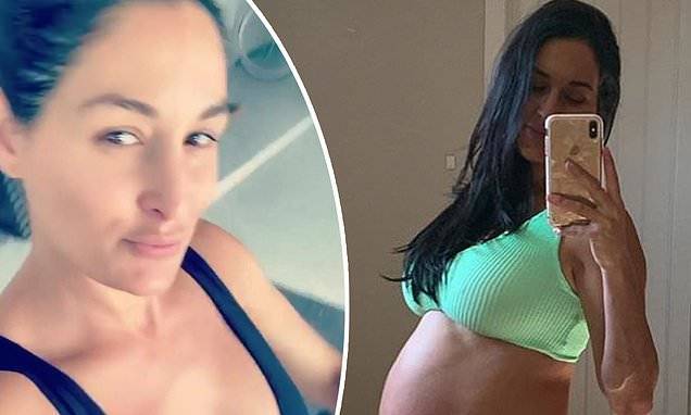Nikki Bella - Nikki Bella flaunts her growing baby bump in a green bra and panties as she marks 30 weeks pregnant - dailymail.co.uk