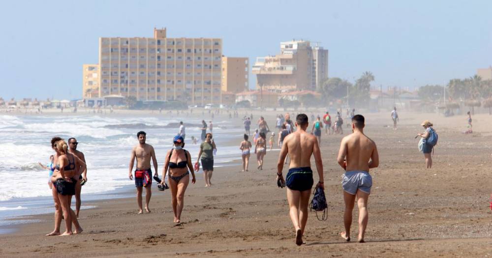 Spanish beach lifeguards banned from performing mouth-to-mouth this summer - dailystar.co.uk - Spain