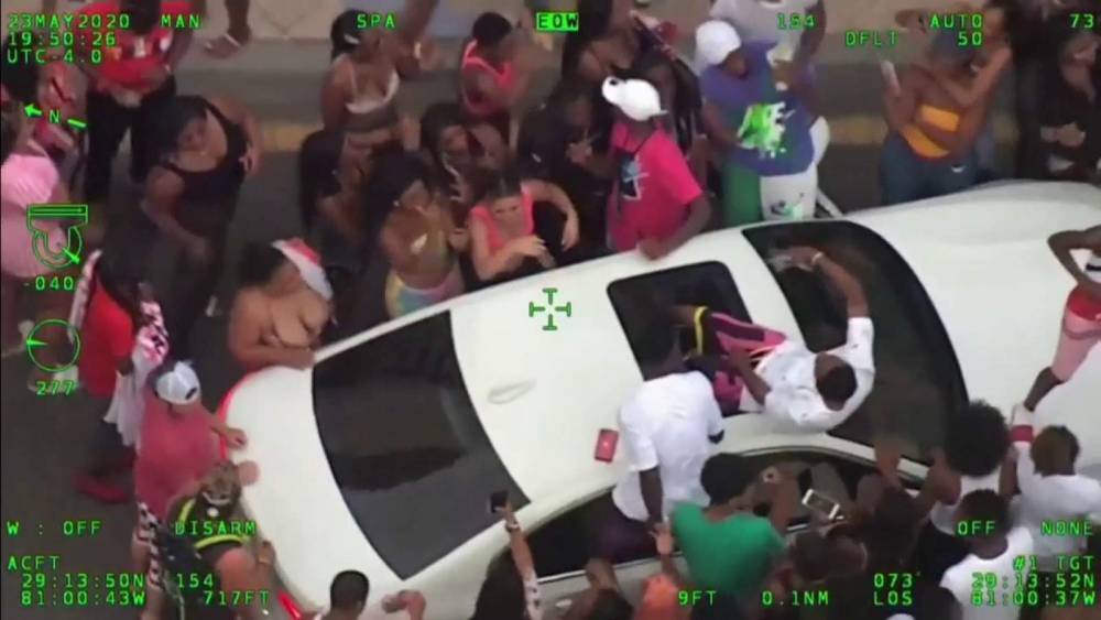 Police: Man who threw money into crowd from car in Daytona Beach arrested - clickorlando.com - state Florida - city Daytona Beach, state Florida