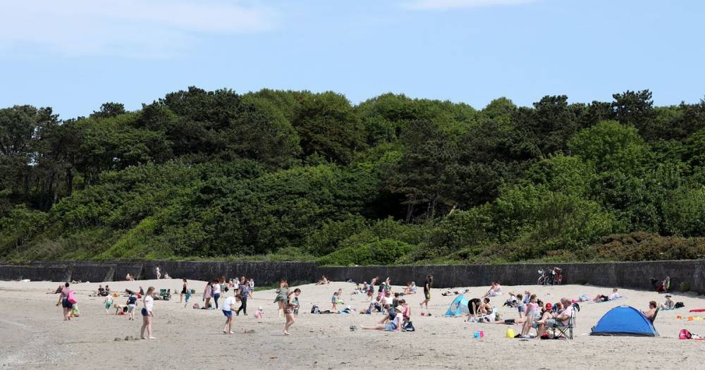 Police attacked and officer kicked in face trying to break up beach gathering - mirror.co.uk - Ireland - city Bangor