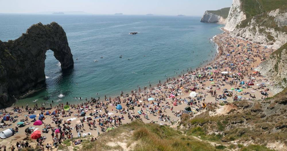 Boris Johnson - Brits flock to beaches in 28C heat causing transport 'chaos' despite lockdown - dailystar.co.uk