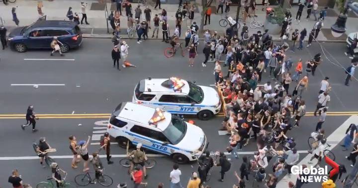 George Floyd - George Floyd protests: Video shows NYPD vehicles driving into crowd - globalnews.ca - city New York