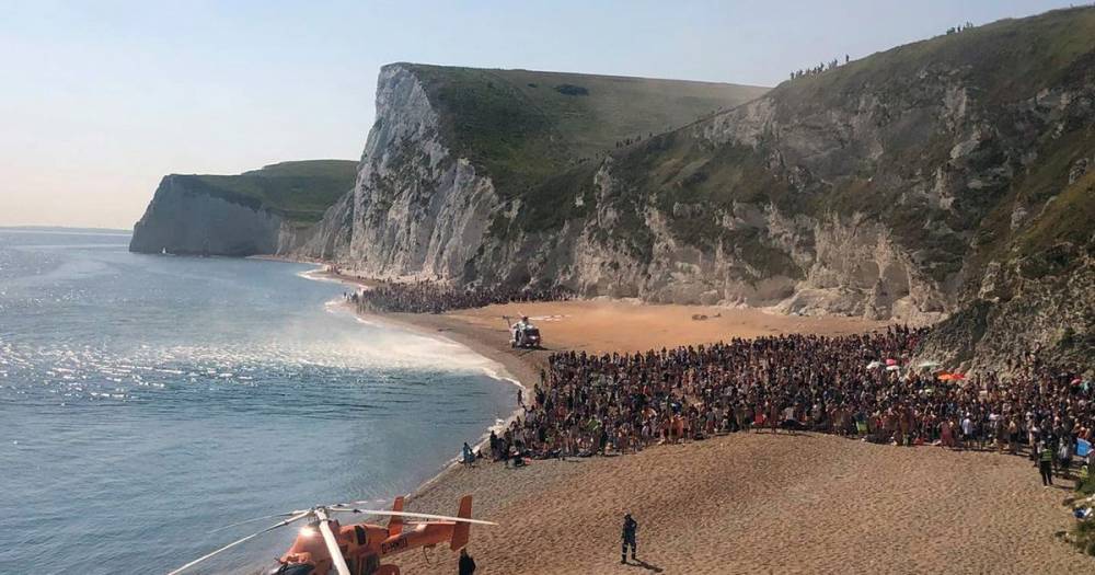 Durdle Door and Lulworth Cove closed to public after four injured jumping 200ft into sea - mirror.co.uk