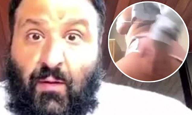 DJ Khaled stops a twerking woman during Instagram Live chat with fans: 'Lets be respectful' - dailymail.co.uk