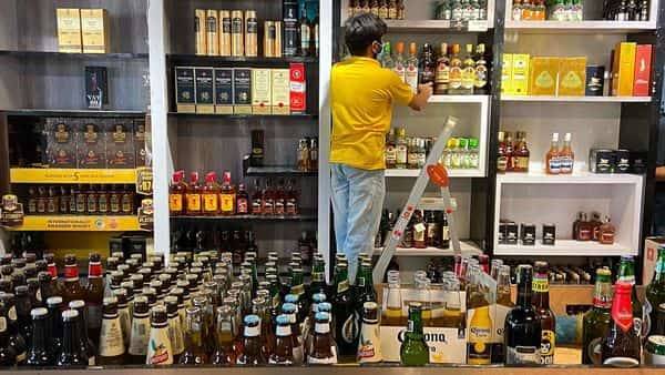 Opening of liquor stores celebrated with prayers, aarti and flowers - livemint.com - India