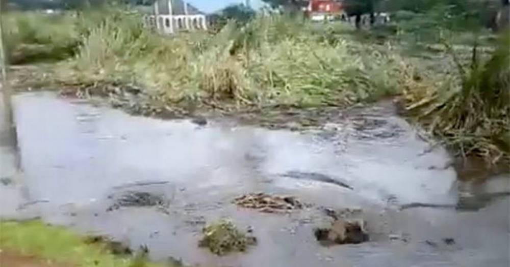 Astonishing moment sinkhole swallows river in front of terrified onlookers - dailystar.co.uk - Kenya