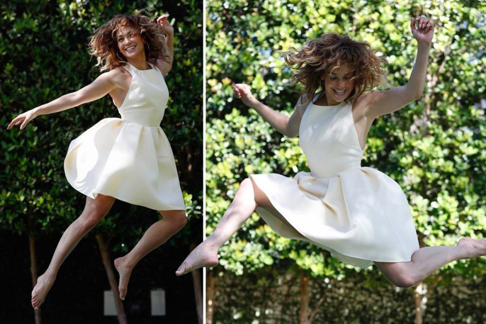 Jennifer Lopez - Jennifer Lopez stuns in a white dress during trampoline photo shoot as she reveals how to stay ‘grateful’ in quarantine - thesun.co.uk