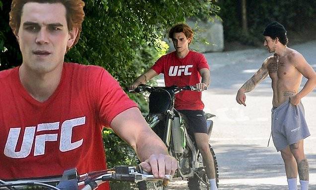 Riverdale star KJ Apa learns how to ride a dirtbike with the help of his personal trainer Alex Fine - dailymail.co.uk