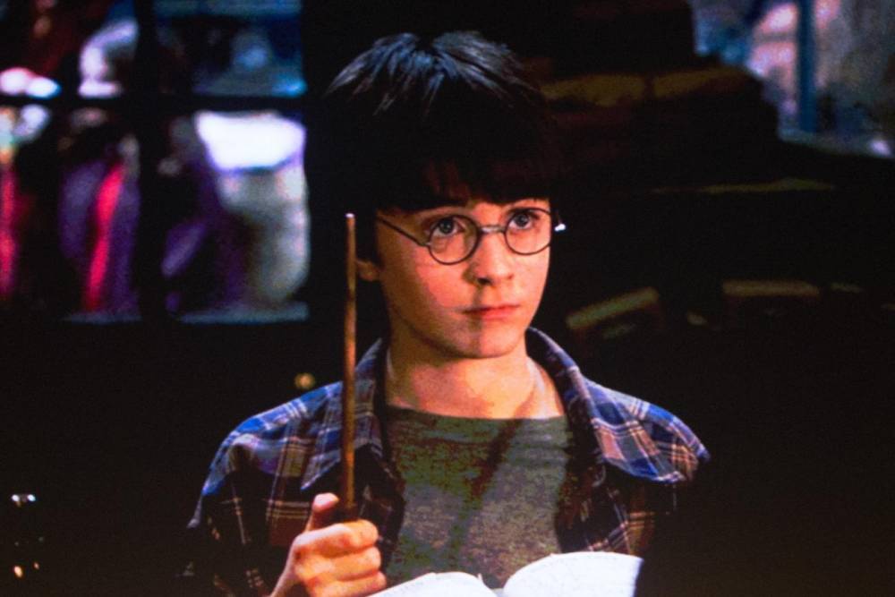 Daniel Radcliffe - Eddie Redmayne - Claudia Kim - The Sorcerer's Stone to Bring A Bit of Hogwarts Home - tvguide.com