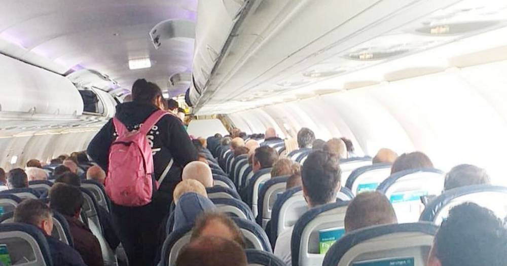 Aer Lingus - London Heathrow - Passengers put on packed flight to London with ‘no social distancing whatsoever’ - mirror.co.uk