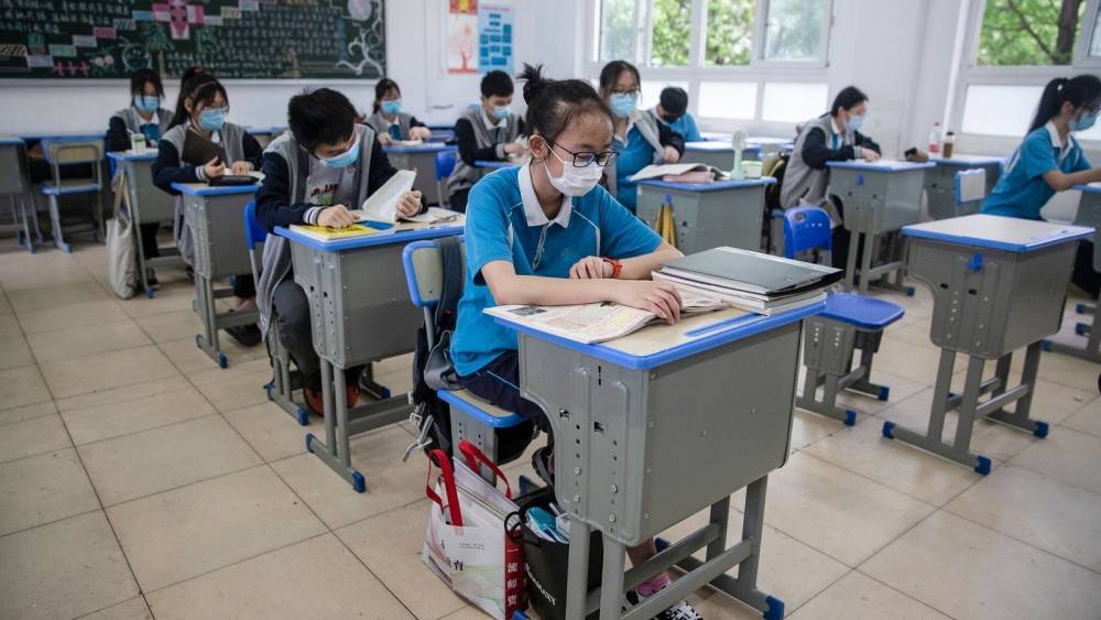 Students in China's virus centre Wuhan return to school - rte.ie - China - city Wuhan - province Hubei