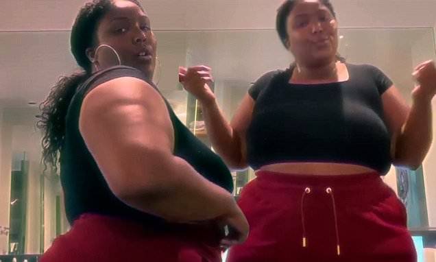 Lizzo admires herself in a pair of red shorts in hilarious Instagram video - dailymail.co.uk