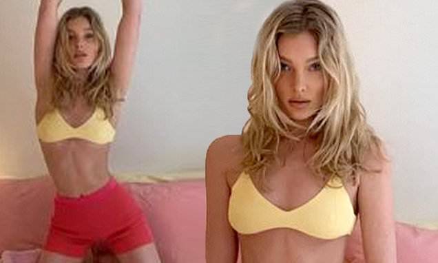 Elsa Hosk - Elsa Hosk says the rain has been getting her down so she slipped into a bright colored bra - dailymail.co.uk - Sweden - city Stockholm
