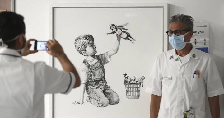 Banksy donates new artwork to U.K. hospital showing nurse as superhero - globalnews.ca