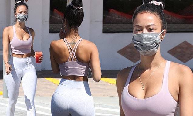 Draya Michele dons protective mask as she flaunts her endless curves in leggings and a sports bra - dailymail.co.uk - Los Angeles - city Los Angeles