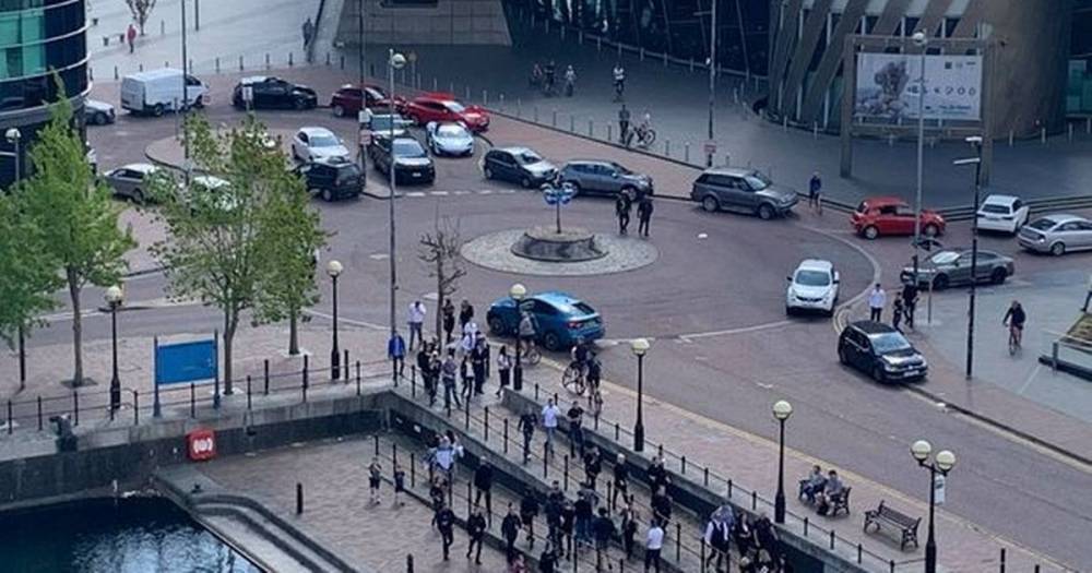 'Up to 100' people moved on by police as they gather to soak up sun with champagne - mirror.co.uk - city Manchester