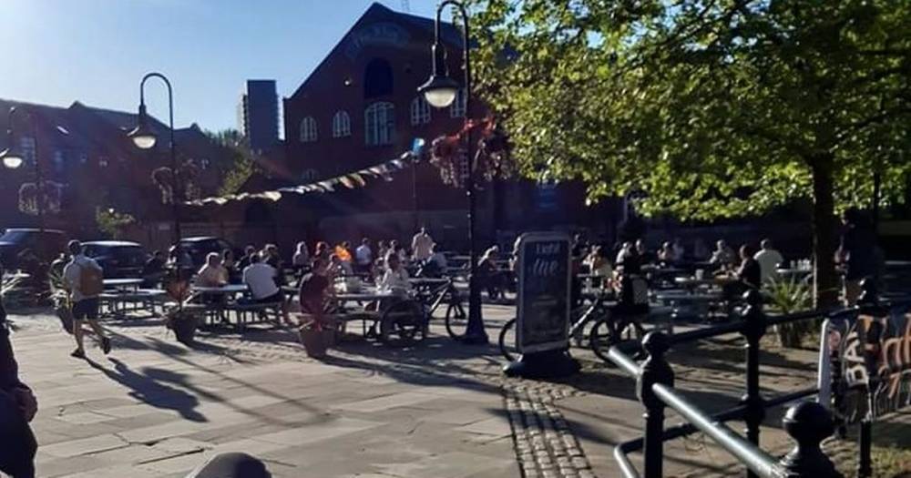 Bar denies breaking lockdown rules after picture shows dozens congregating outside - manchestereveningnews.co.uk - city Manchester