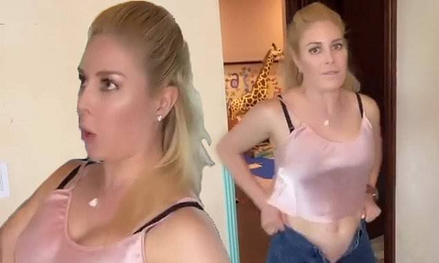 Heidi Montag - Heidi Montag struggles to button-up her jeans as she jumps around her house in funny TikTok video - dailymail.co.uk