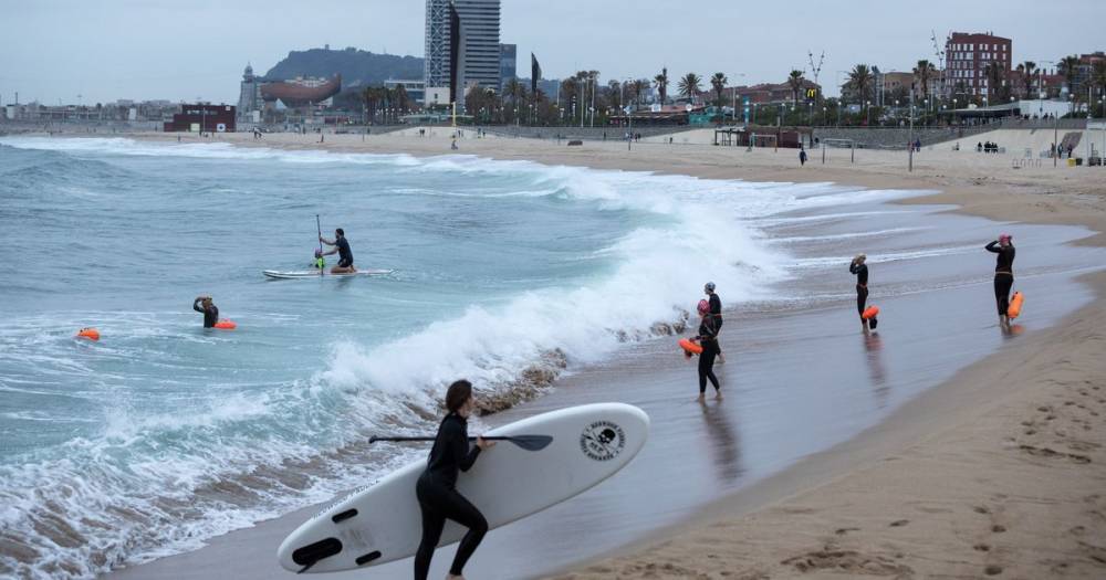 Beaches open in Barcelona as Spain decides on next steps of lockdown exit - dailystar.co.uk - Spain