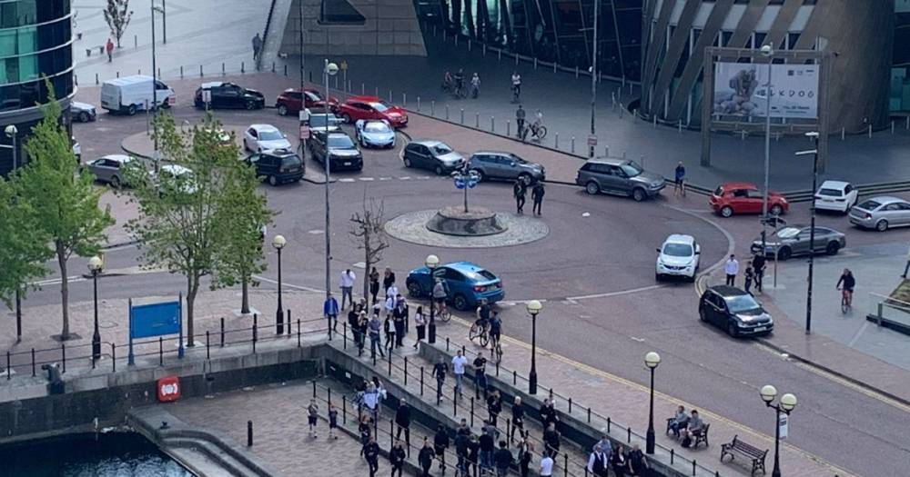 New footage shows around 30 cars abandoned by people taking part in a champagne gathering at Salford Quays - manchestereveningnews.co.uk - city Media